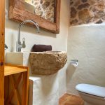 bathroom in natural style in stone finca