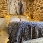 bedroom in natural stone spanish cottage