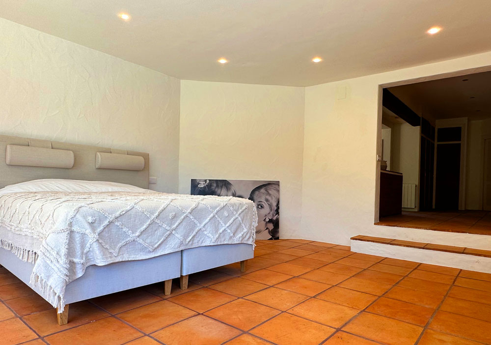master bedroom downstairs luxury stone finca Senija